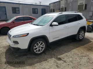2016 Jeep Cherokee Altitude with VIN 1C4PJLCB4GW216385, listed as a Copart auction lot 57459925 with 154,521 mi miles and Clean title. Bid and sale history available at DreamBid. Image 1.