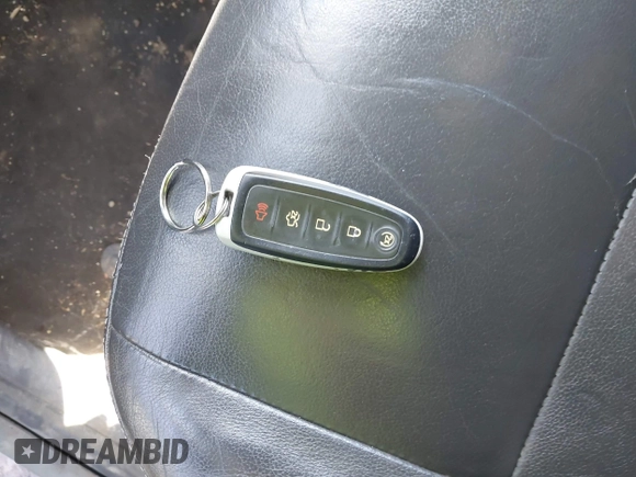 2014 Ford Escape Titanium with VIN 1FMCU9JX1EUB94776, listed as a IAAI auction lot 42063678 with 138,036 mi miles. Bid and sale history available at carsss.com. Image 11.
