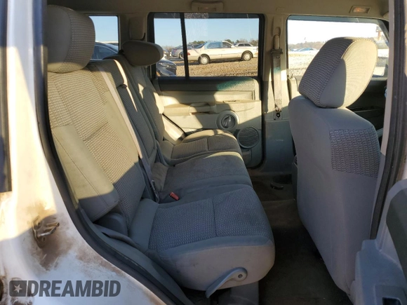 2006 Jeep Commander with VIN 1J8HH48N86C168763, listed as a Copart auction lot 88930175 with 289,933 mi miles and Salvage Title. Bid and sale history available at carsss.com. Image 11.