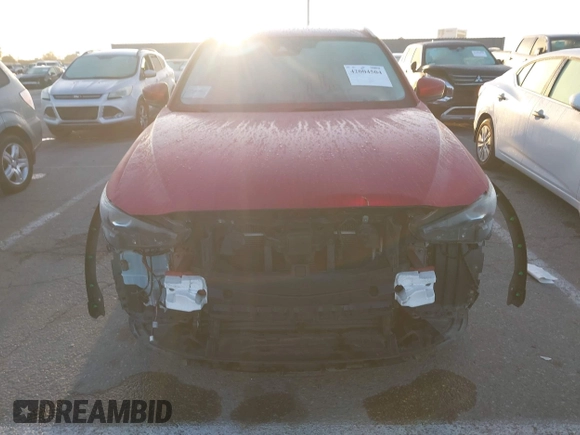 2020 Mazda CX-5 Touring z VIN JM3KFACM1L0855474, wystawiony jako IAAI lot #42004504 z przebiegiem 82 505 mil mil oraz . Historia ofert i sprzedaży dostępna na DreamBid. Obrazek 12.