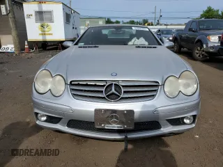 2005 Mercedes-Benz SL z VIN WDBSK79F05F094158, wystawiony jako Copart lot #60888905 z przebiegiem Nie podano mil oraz Szkoda całkowita • Salvage title. Historia ofert i sprzedaży dostępna na DreamBid. Obrazek 5.
