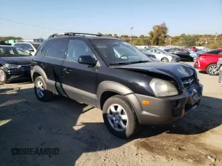 2005 Hyundai Tucson GLS with VIN KM8JN12D45U065618, listed as a Copart auction lot 77370754 with 87,525 mi miles and Salvage Title. Bid and sale history available at carsss.com. Image 4.