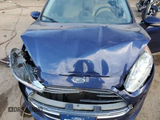 2016 Ford Fiesta Titanium z VIN 3FADP4CJ5GM175110, wystawiony jako Copart lot #89137195 z przebiegiem 129 193 mil mil oraz Szkoda całkowita • Salvage title. Historia ofert i sprzedaży dostępna na DreamBid. Obrazek 12.
