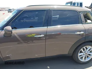 2013 MINI Countryman S ALL4 with VIN WMWZC5C54DWP34224, listed as a IAAI auction lot 42141400 with 33,307 mi miles and . Bid and sale history available at DreamBid. Image 14.