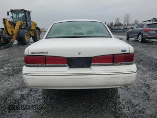 1995 Ford Crown Victoria LX с VIN 2FALP74W1SX200511, выставлен на аукционе Copart как лот 48807055 с пробегом 62 133 миль миль и Списание • Salvage title. История ставок и продаж доступна на DreamBid. Изображение 6.