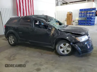2013 Dodge Journey American Value with VIN 3C4PDCAB1DT580131, listed as a Copart auction lot 78070164 with 145,994 mi miles and Salvage Title. Bid and sale history available at DreamBid. Image 4.