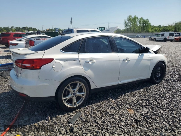 2016 Ford Focus Titanium z VIN 1FADP3J25GL201003, wystawiony jako Copart lot #53799745 z przebiegiem 194 055 mil mil oraz Szkoda całkowita • Salvage title. Historia ofert i sprzedaży dostępna na DreamBid. Obrazek 3.