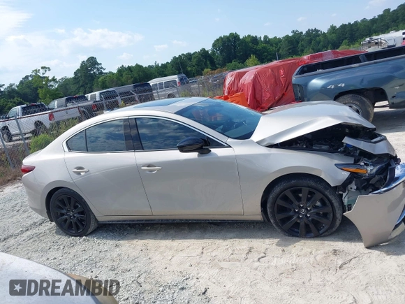 2022 Mazda 3 2.5 Turbo with VIN 3MZBPBAY8NM300598, listed as a IAAI auction lot 42569553 with 27,736 mi miles and . Bid and sale history available at DreamBid. Image 13.
