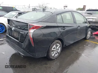 2017 Toyota Prius Two with VIN JTDKARFU8H3051986, listed as a IAAI auction lot 41579576 with 287,322 mi miles. Bid and sale history available at carsss.com. Image 4.
