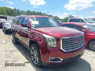 2018 GMC Yukon XL Denali z VIN 1GKS1HKJ6JR312495, wystawiony jako IAAI lot #42177446 z przebiegiem 94 268 mil mil oraz . Historia ofert i sprzedaży dostępna na DreamBid. Obrazek 13.