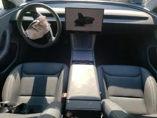 2025 Tesla Model 3 Long Range with VIN 5YJ3E1EA4SF965566, listed as a Copart auction lot 56820165 with 1,041 mi miles and Salvage title. Bid and sale history available at DreamBid. Image 8.