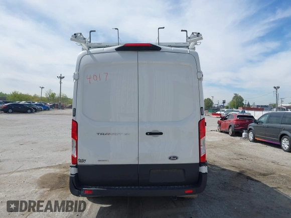 2023 Ford Transit Cargo z VIN 1FTYE1CG2PKB14938, wystawiony jako IAAI lot #41964017 z przebiegiem 6 902 mil mil oraz . Historia ofert i sprzedaży dostępna na DreamBid. Obrazek 16.