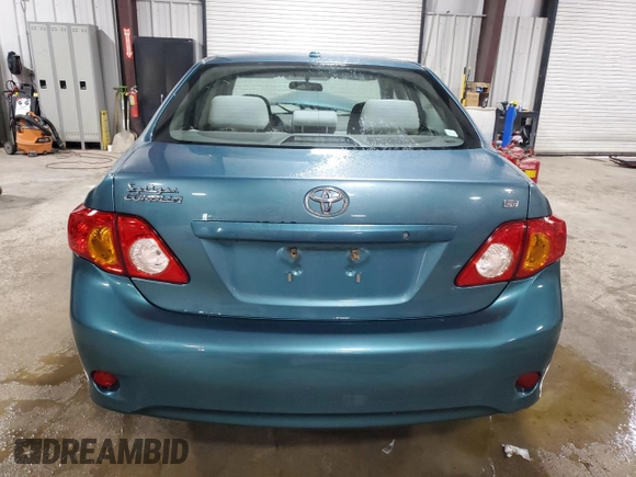 2010 Toyota Corolla with VIN 2T1BU4EE9AC373148, listed as a Copart auction lot 52305235 with 150,476 mi miles and Salvage Title. Bid and sale history available at DreamBid. Image 6.