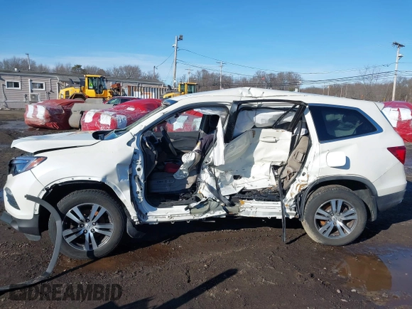 2017 Honda Pilot EX with VIN 5FNYF6H31HB051328, listed as a IAAI auction lot 41598959 with 37,799 mi miles and . Bid and sale history available at DreamBid. Image 16.