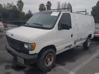 2000 Ford Econoline Cargo with VIN 1FTRE142XYHB26700, listed as a IAAI auction lot 41448848 with 198,065 mi miles. Bid and sale history available at carsss.com. Image 2.