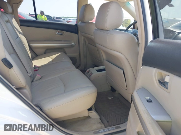 2006 Lexus RX 400h with VIN JTJHW31U560034896, listed as a IAAI auction lot 42053635 with 189,409 mi miles and . Bid and sale history available at DreamBid. Image 8.