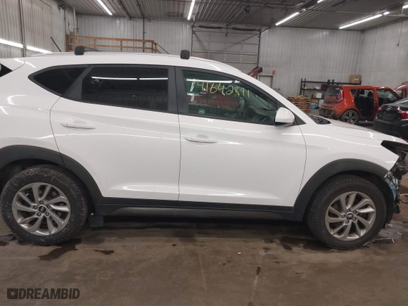 2016 Hyundai Tucson SE with VIN KM8J33A48GU117807, listed as a IAAI auction lot 41642891 with 142,371 mi miles. Bid and sale history available at carsss.com. Image 14.