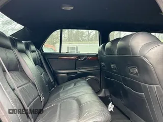 2004 Cadillac DeVille Limousine z VIN 1GEEH90Y24U550055, wystawiony jako Copart lot #42157535 z przebiegiem 44 344 mil mil oraz Czysty tytuł • Clean title. Historia ofert i sprzedaży dostępna na DreamBid. Obrazek 6.