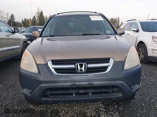 2003 Honda CR-V EX with VIN JHLRD788X3C004304, listed as a IAAI auction lot 41385254 with 143,940 mi miles. Bid and sale history available at carsss.com. Image 12.