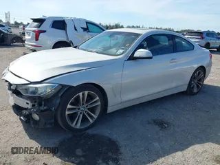 2016 BMW 4 Series 428i with VIN WBA3N7C57GK227468, listed as a IAAI auction lot 41188647 with 81,115 mi miles and . Bid and sale history available at carsss.com. Image 2.