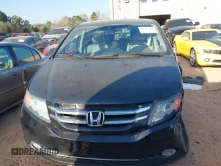 2014 Honda Odyssey Touring with VIN 5FNRL5H90EB077054, listed as a IAAI auction lot 41904456 with 197,869 mi miles and . Bid and sale history available at carsss.com. Image 12.