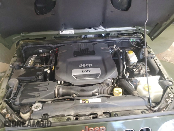 2016 Jeep Wrangler Sahara с VIN 1C4AJWBG5GL221617, выставлен на аукционе Copart как лот 48805755 с пробегом 70 883 миль миль и Списание • Salvage title. История ставок и продаж доступна на DreamBid. Изображение 12.