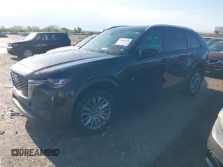 2024 Mazda CX-90 Select z VIN JM3KKAHD3R1165975, wystawiony jako IAAI lot #42086144 z przebiegiem 10 317 mil mil oraz . Historia ofert i sprzedaży dostępna na DreamBid. Obrazek 2.