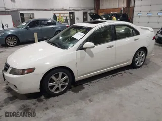 2004 Acura TSX with VIN JH4CL96884C028475, listed as a IAAI auction lot 41874623 with 168,555 mi miles. Bid and sale history available at carsss.com. Image 2.