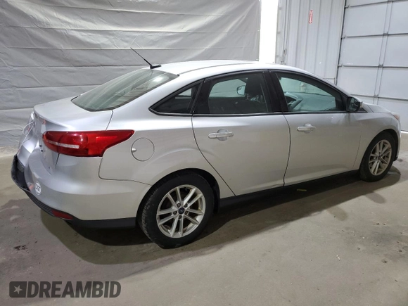 2015 Ford Focus SE with VIN 1FADP3F23FL282798, listed as a Copart auction lot 59588875 with 138,531 mi miles and Salvage title. Bid and sale history available at DreamBid. Image 3.