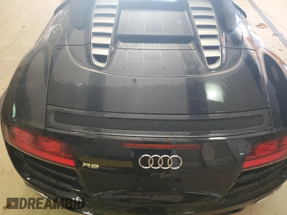 2011 Audi R8 z VIN WUATNAFG7BN002863, wystawiony jako Copart lot #87601245 z przebiegiem Nie podano mil oraz Tytuł czysty. Historia ofert i sprzedaży dostępna na DreamBid. Obrazek 11.
