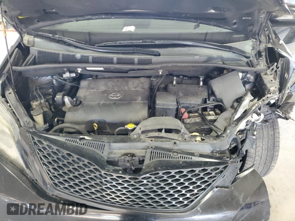 2014 Toyota Sienna SE with VIN 5TDXK3DC5ES418508, listed as a Copart auction lot 69742974 with 210,168 mi miles and Salvage Title. Bid and sale history available at DreamBid. Image 12.
