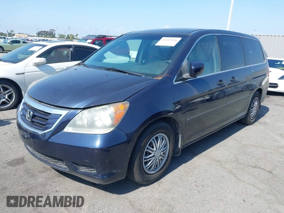 2008 Honda Odyssey LX with VIN 5FNRL38268B025424, listed as a IAAI auction lot 42432326 with 210,644 mi miles and . Bid and sale history available at DreamBid. Image 17.