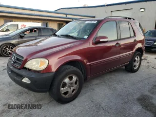 2002 Mercedes-Benz M-Class with VIN 4JGAB54E72A300774, listed as a Copart auction lot 75990134 with 312,541 mi miles and Salvage Title. Bid and sale history available at carsss.com. Image 1.