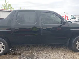 2007 Honda Ridgeline RT with VIN 2HJYK16267H510110, listed as a IAAI auction lot 42145367 with 170,451 mi miles and . Bid and sale history available at DreamBid. Image 13.