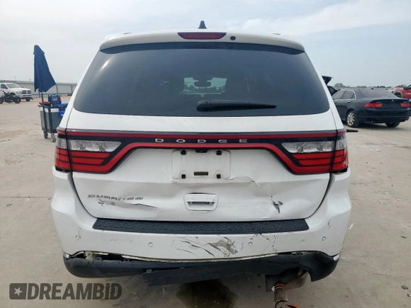 2018 Dodge Durango SXT with VIN 1C4RDHAG0JC329075, listed as a Copart auction lot 56966855 with 176,403 mi miles and Salvage title. Bid and sale history available at DreamBid. Image 6.