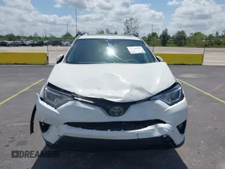2018 Toyota RAV4 XLE with VIN 2T3WFREV9JW490324, listed as a IAAI auction lot 42298261 with 167,727 mi miles and . Bid and sale history available at DreamBid. Image 12.