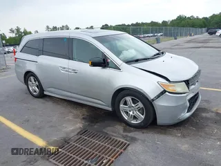 2012 Honda Odyssey Touring с VIN 5FNRL5H93CB122128, выставлен на аукционе IAAI как лот 42206838 с пробегом 181 605 миль миль и . История ставок и продаж доступна на DreamBid. Изображение 1.