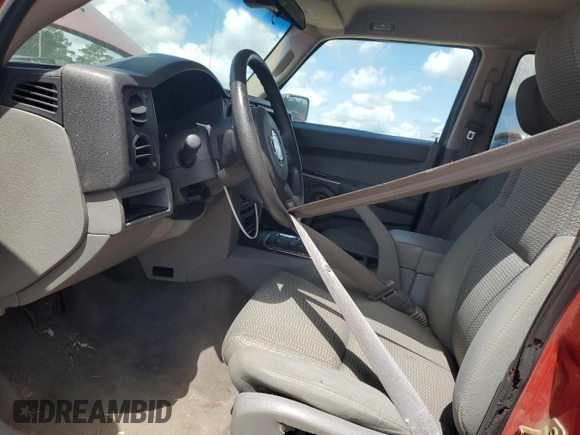 2006 Jeep Commander with VIN 1J8HH48KX6C203308, listed as a Copart auction lot 64456765 with 185,794 mi miles and Salvage title. Bid and sale history available at DreamBid. Image 7.