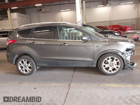 2015 Ford Escape Titanium с VIN 1FMCU9J98FUC05727, выставлен на аукционе IAAI как лот 42229328 с пробегом 112 896 миль миль и . История ставок и продаж доступна на DreamBid. Изображение 14.