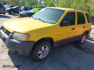 2003 Ford Escape XLS Popular with VIN 1FMYU92113KD90189, listed as a IAAI auction lot 42082279 with 261,215 mi miles. Bid and sale history available at carsss.com. Image 2.