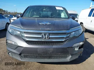2017 Honda Pilot EX-L with VIN 5FNYF6H59HB101815, listed as a IAAI auction lot 41704661 with 130,479 mi miles and . Bid and sale history available at DreamBid. Image 12.