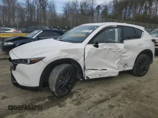 2024 Mazda CX-5 2.5 Carbon Turbo with VIN JM3KFBAY7R0405607, listed as a Copart auction lot 42331165 with 9,207 mi miles and Salvage Title. Bid and sale history available at carsss.com. Image 1.