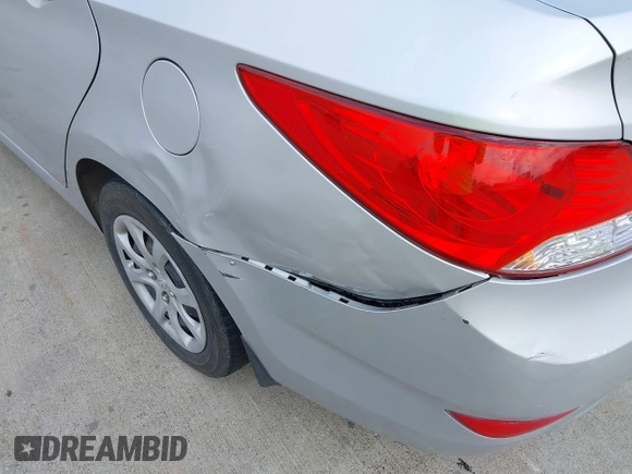 2012 Hyundai Accent GLS with VIN KMHCT4AE7CU252553, listed as a IAAI auction lot 42100914 with 232,705 mi miles. Bid and sale history available at carsss.com. Image 6.