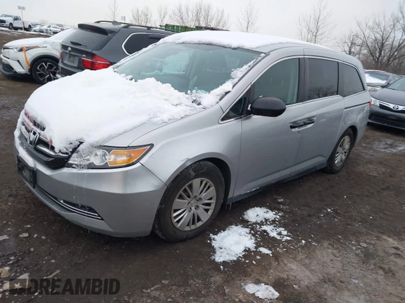 2014 Honda Odyssey LX with VIN 5FNRL5H22EB080346, listed as a IAAI auction lot 41282783 with 101,000 mi miles and . Bid and sale history available at carsss.com. Image 18.