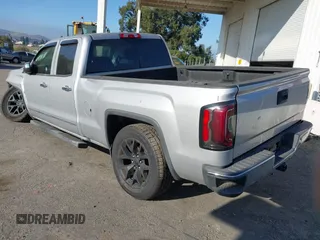 2017 GMC Sierra 1500 SLT z VIN 1GTV2NEC6HZ102412, wystawiony jako IAAI lot #41170633 z przebiegiem 163 321 mil mil oraz . Historia ofert i sprzedaży dostępna na DreamBid. Obrazek 3.