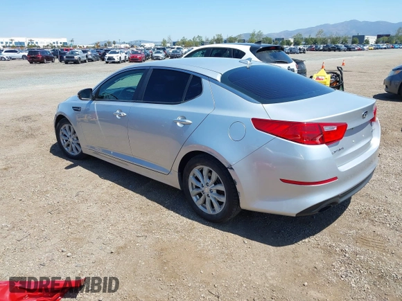 2015 Kia Optima EX with VIN 5XXGN4A73FG436223, listed as a IAAI auction lot 41970418 with 174,002 mi miles. Bid and sale history available at carsss.com. Image 3.