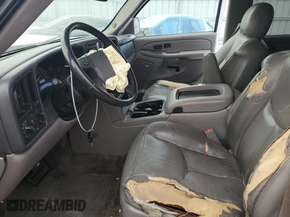 2004 Chevrolet Tahoe LS z VIN 1GNEC13T24R277234, wystawiony jako Copart lot #51157385 z przebiegiem 192 458 mil mil oraz Nie do naprawy • Non repairable. Historia ofert i sprzedaży dostępna na DreamBid. Obrazek 7.