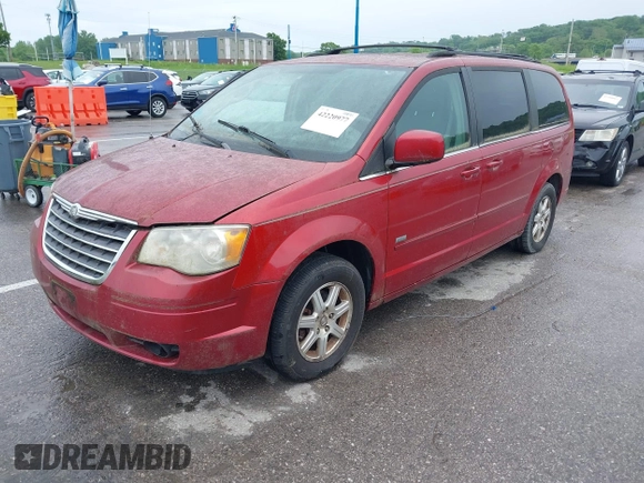 2008 Chrysler Town & Country Touring with VIN 2A8HR54PX8R731719, listed as a IAAI auction lot 42220977 with 128,977 mi miles and . Bid and sale history available at DreamBid. Image 2.