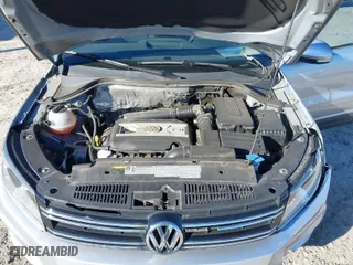 2017 Volkswagen Tiguan Wolfsburg Edition with VIN WVGSV7AX8HK009961, listed as a IAAI auction lot 41822883 with 70,911 mi miles. Bid and sale history available at carsss.com. Image 10.