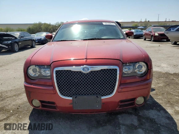 2010 Chrysler 300 with VIN 2C3CA2CV4AH330352, listed as a Copart auction lot 70720414 with 164,673 mi miles and Salvage Title. Bid and sale history available at carsss.com. Image 5.
